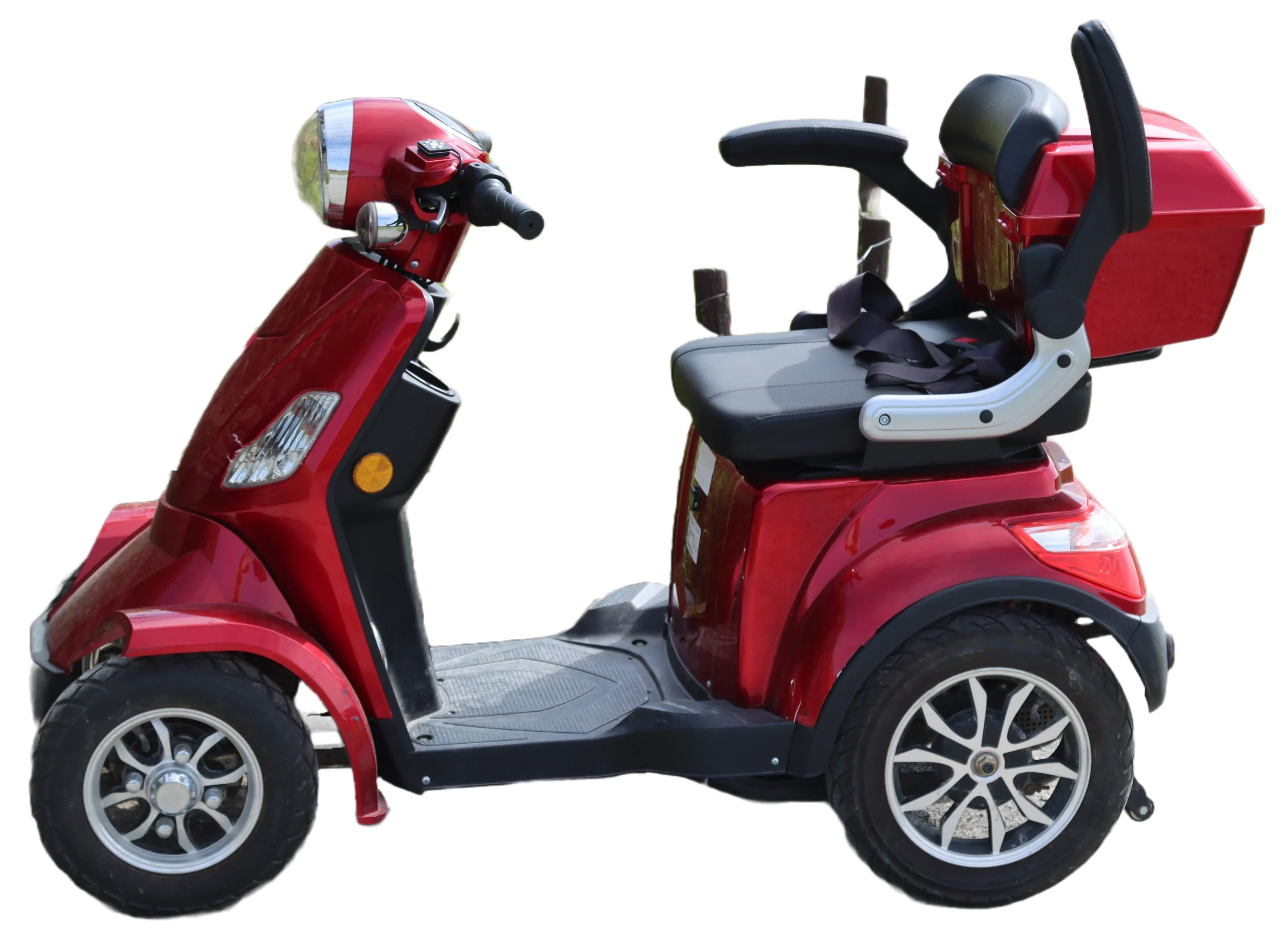 Red electric mobility scooter with ergonomic black seat and safety belt, featuring circular headlights, rear storage compartment, and four stylish alloy wheels. fsebattery's accessible transportation solution isolated on white background.