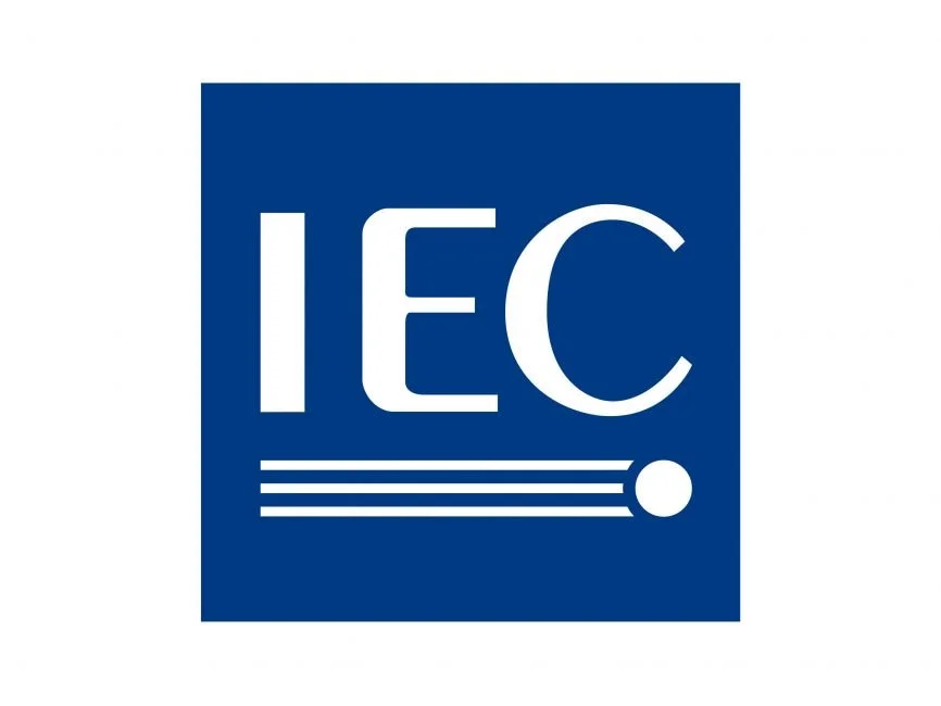 Official IEC compliance emblem: Deep blue square background (PANTONE 286C) with bold white "IEC" typography and triple-line connector symbol, representing adherence to international battery safety and performance standards