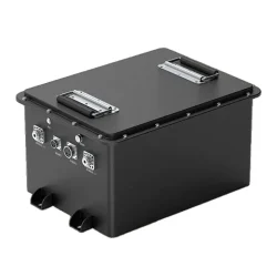 Black industrial-grade battery unit with silver carrying handles and multi-port interfaces. Matte finish casing features "BA SOUND LEVEL 111" technical markings indicating robust performance specifications. Isolated on white background.